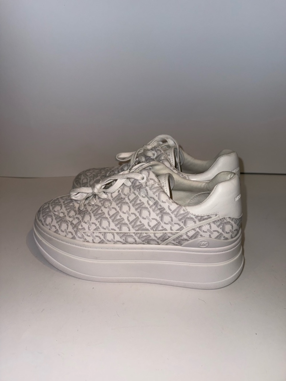 Michael Kors Cream and White MK Monogram Platform Sneakers - Picture 4 of 6